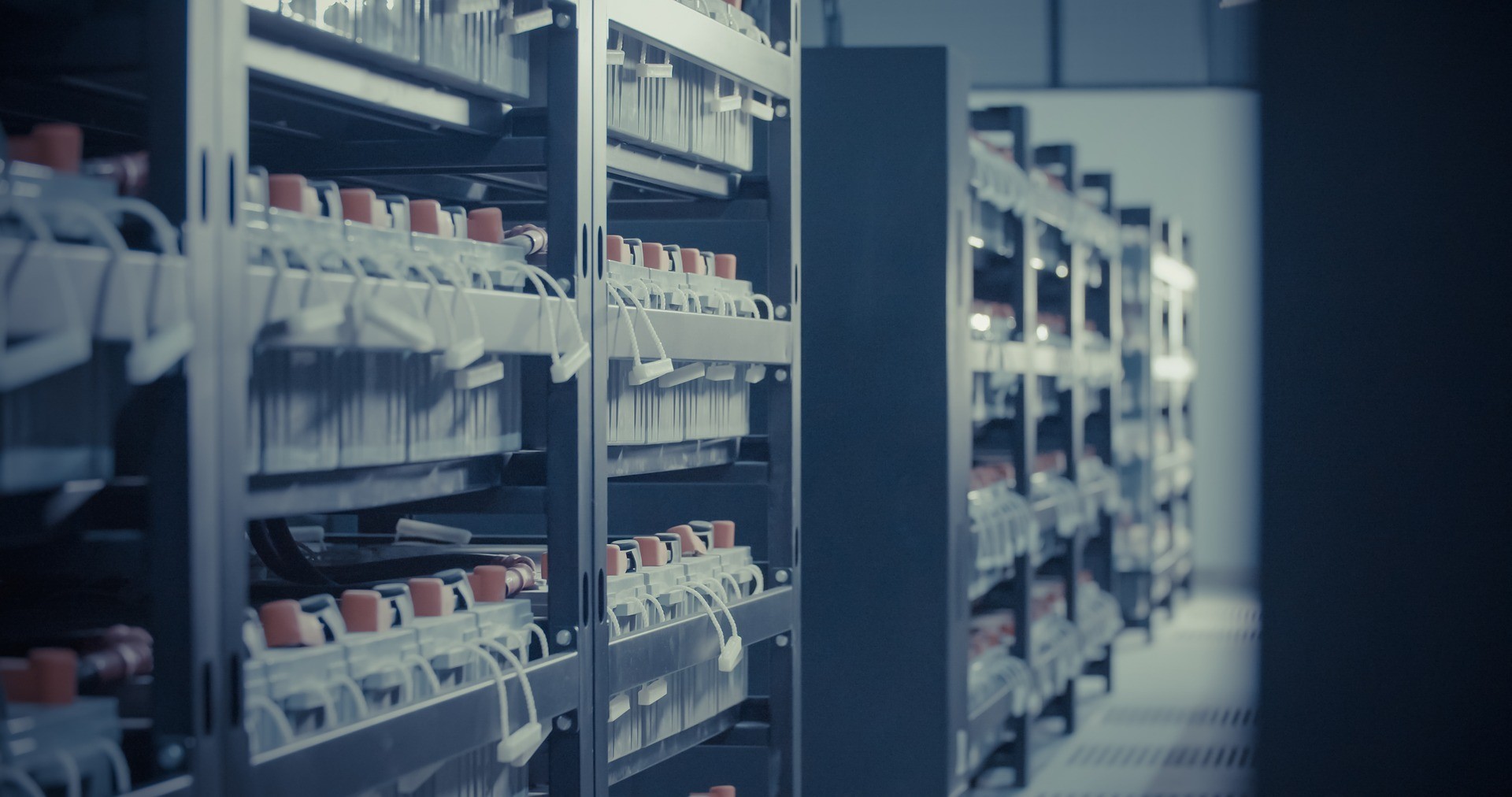 Many mail sorting bins in a postal distribution center