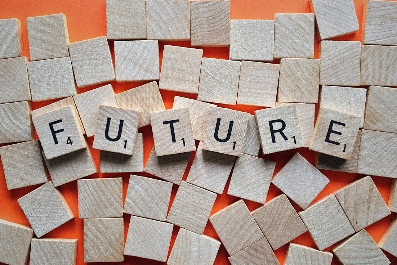 Text 'Future' spelt out on wooden scrabble tiles